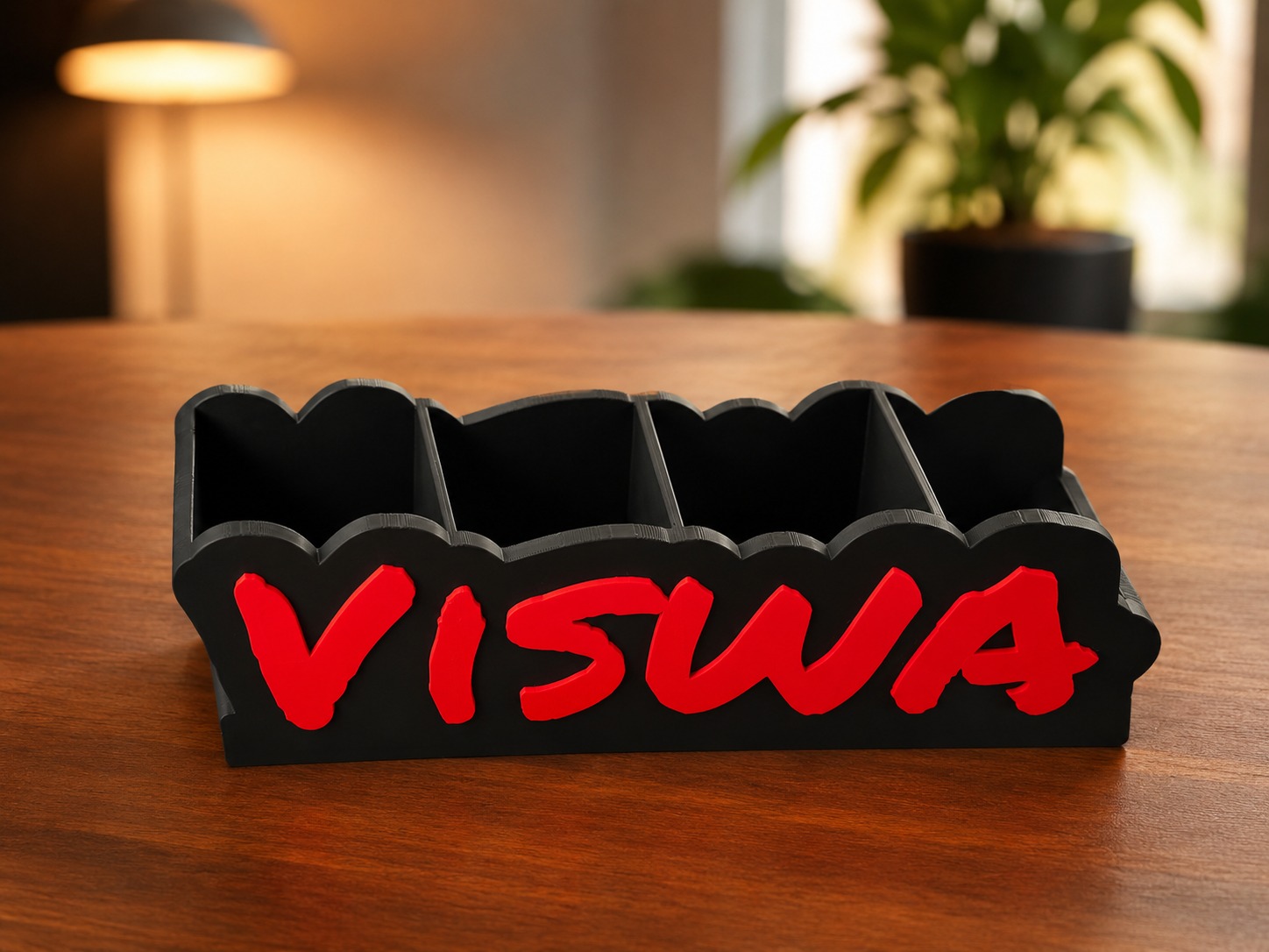 Personalised name desk organiser with a contrasting red name and black compartments